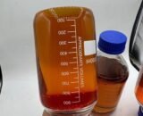 A sleek, amber glass bottle of CAT 3 D9 THC Liquid with a black dropper cap, placed on a wooden surface with cannabis leaves in the background.