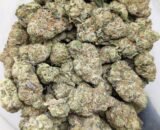 Close-up of Zkittlez cannabis strain buds with vibrant colors and frosty trichomes